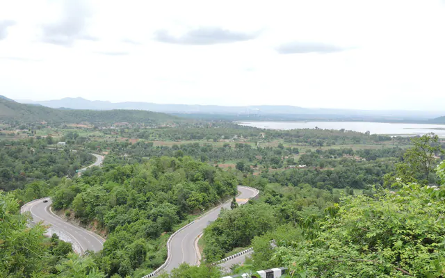 A hill road winding through forest above the Patratu reservoir, Patratu Valley, Jharkhand.